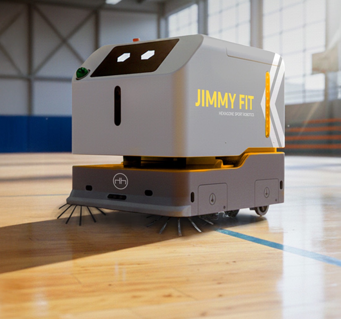 Auto-laveuse autonome Jimmy Fit sur le parquet d'un gymnase